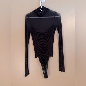 NWOT Intimately by Free People sheer bodysuit 
Black